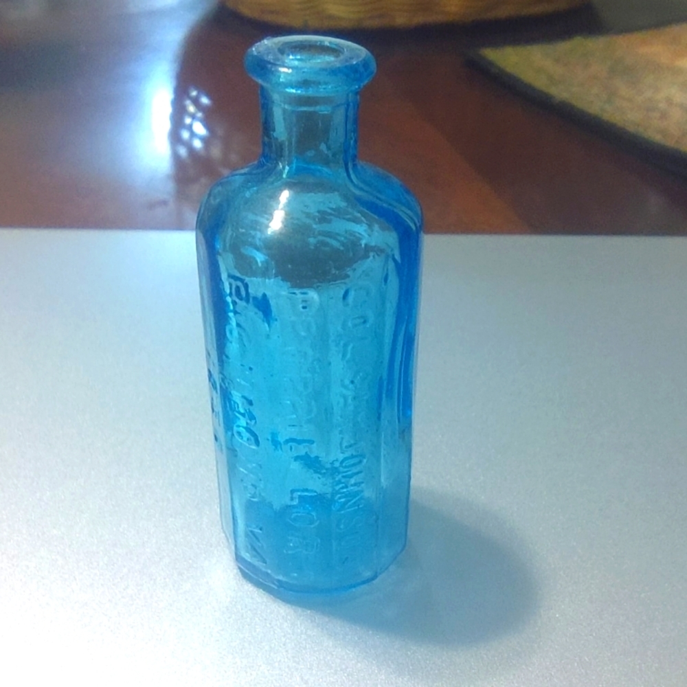 Vintage blue Lancaster vegetable. Small bottle